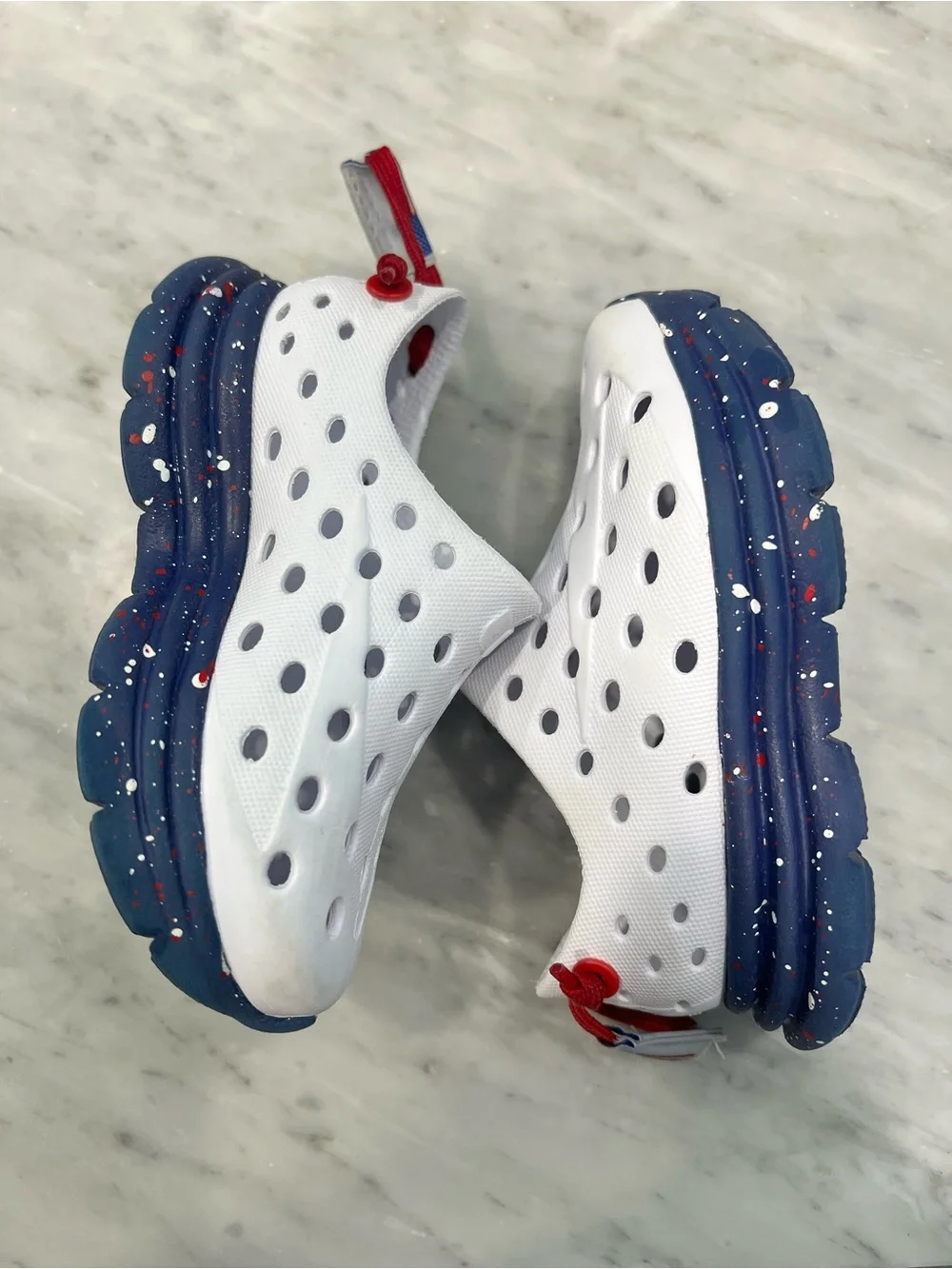 Kids White Slip-On Water Shoes with Navy Speckled Sole and Red Pull Tab